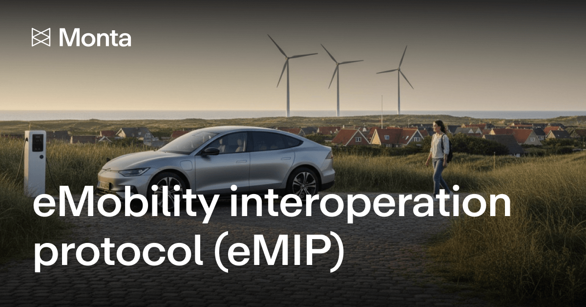A sleek electric vehicle parked near a charging station, with wind turbines and coastal houses in the background, under a soft sunset.