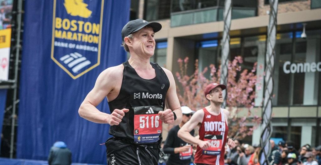 Runner wearing a Monta vest and bib number 5116 competing in the 130th Boston Marathon