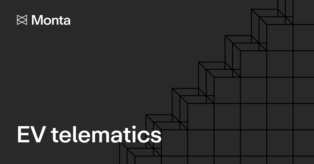 Abstract graphic featuring layered cubes in a gradient from grey to black, with "EV Telematics" in bold white text below.