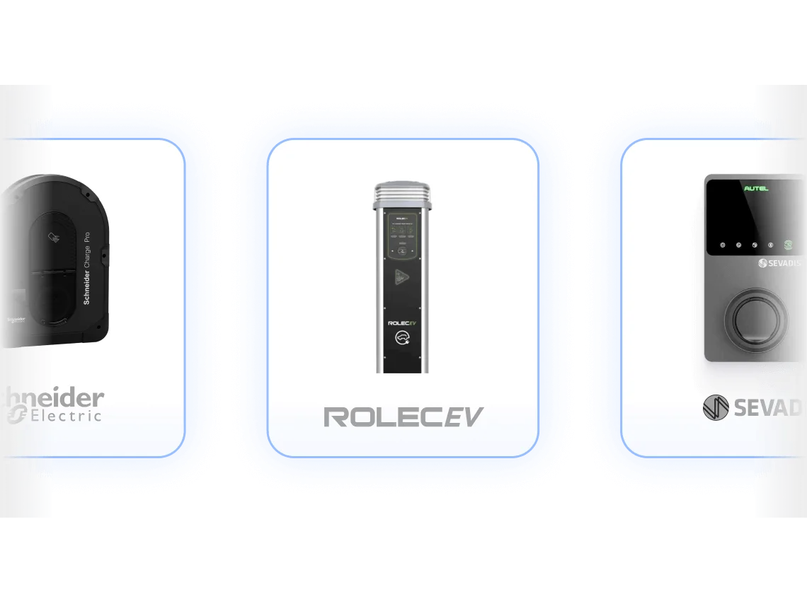 Three electric vehicle chargers in a row: left charger with Schneider Electric logo, centre with ROLECEV branding, right with SEVA logo.