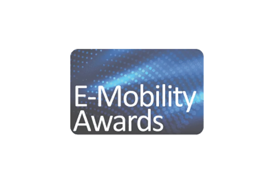 Blue and black graphic featuring the text "E-Mobility Awards" in bold white letters, with a dynamic, dotted background pattern.