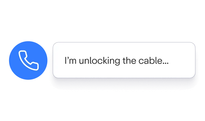 A blue telephone icon beside a text box displaying the message, “I’m unlocking the cable...” on a white background.